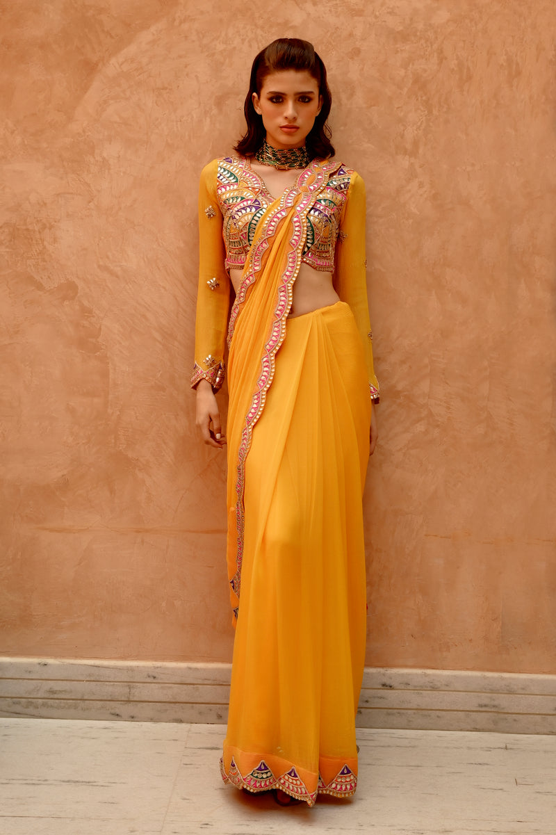 Mango yellow saree with pre-stitched palla and pleats  with bejewelled jaal full sleeve blouse