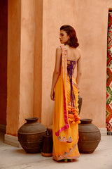 Mango yellow saree with pre-stitched palla and pleats  with bejewelled bandeau blouse