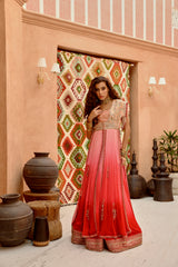 Aleah coral ombre set with longline jacket with crop inner and ruched lehenga.