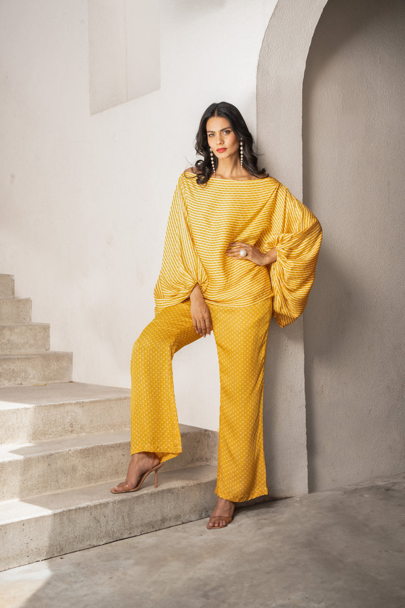 Gulbahar marigold off shoulder balloon sleeve top with pants set.